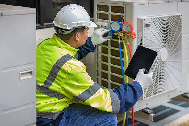 Professional Heat Pump Repair technician working in Purcell, OK